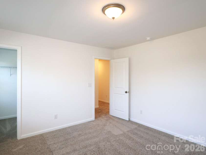 1350 Fremont Drive, Wingate, NC 28174.  MLS# CAR4382334, YatesRealty ID 24180. Secondary bedroom
