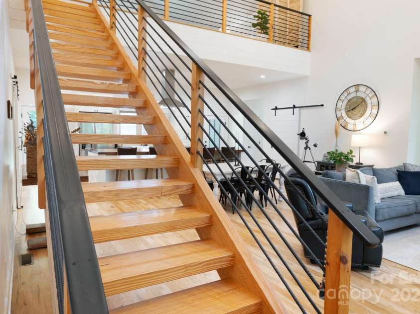 628 Brush Creek Road, Fairview, NC 28730.  MLS# CAR4256769, YatesRealty ID 24181. Custom, hand crafted staircase and railing