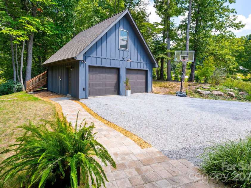628 Brush Creek Road, Fairview, NC 28730.  MLS# CAR4256769, YatesRealty ID 24181. Garage with unfinished flex space above