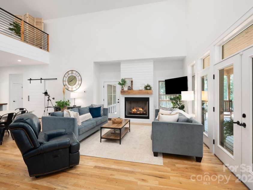 628 Brush Creek Road, Fairview, NC 28730.  MLS# CAR4256769, YatesRealty ID 24181. Light-filled and serene with a seamless flow between interior and exterior spaces