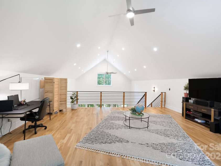 628 Brush Creek Road, Fairview, NC 28730.  MLS# CAR4256769, YatesRealty ID 24181. Loft space would make a great office, wellness room or guest space