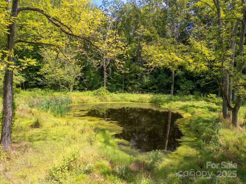 628 Brush Creek Road, Fairview, NC 28730.  MLS# CAR4256769, YatesRealty ID 24181. Nature surrounds