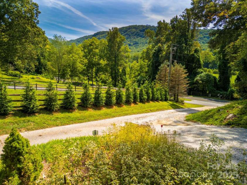 628 Brush Creek Road, Fairview, NC 28730.  MLS# CAR4256769, YatesRealty ID 24181. Nestled in the valley