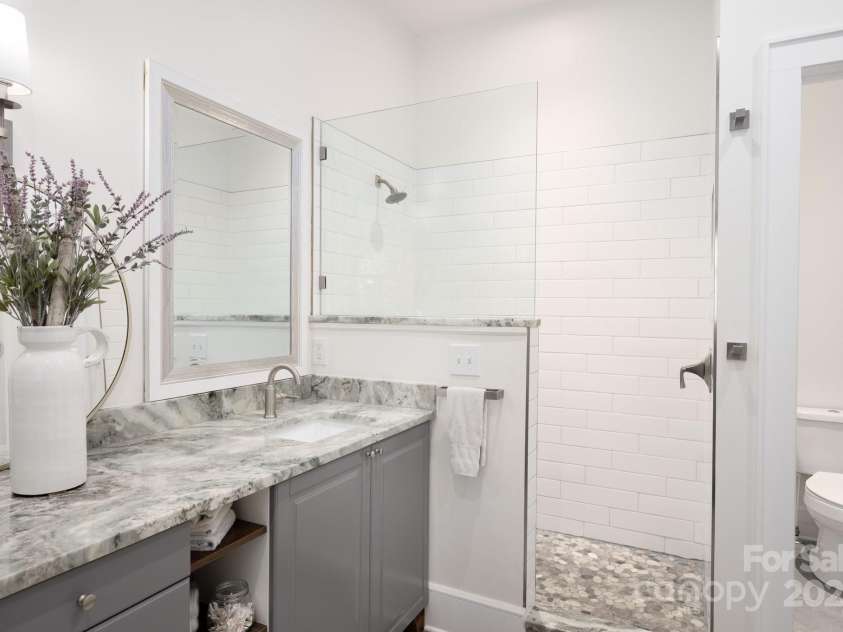 628 Brush Creek Road, Fairview, NC 28730.  MLS# CAR4256769, YatesRealty ID 24181. Peaceful primary en-suite bathroom