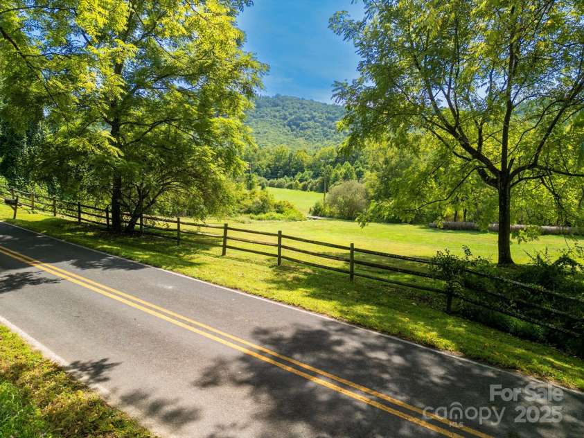 628 Brush Creek Road, Fairview, NC 28730.  MLS# CAR4256769, YatesRealty ID 24181. View from the pond