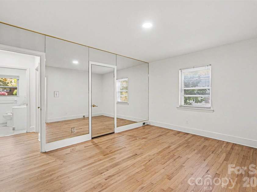 955 Hickory Nut Street, Charlotte, NC 28205.  MLS# CAR4372361, YatesRealty ID 24185. Bedroom with refinished white oak flooring