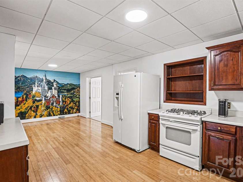 955 Hickory Nut Street, Charlotte, NC 28205.  MLS# CAR4372361, YatesRealty ID 24185. Kitchen view towards eat in dining area