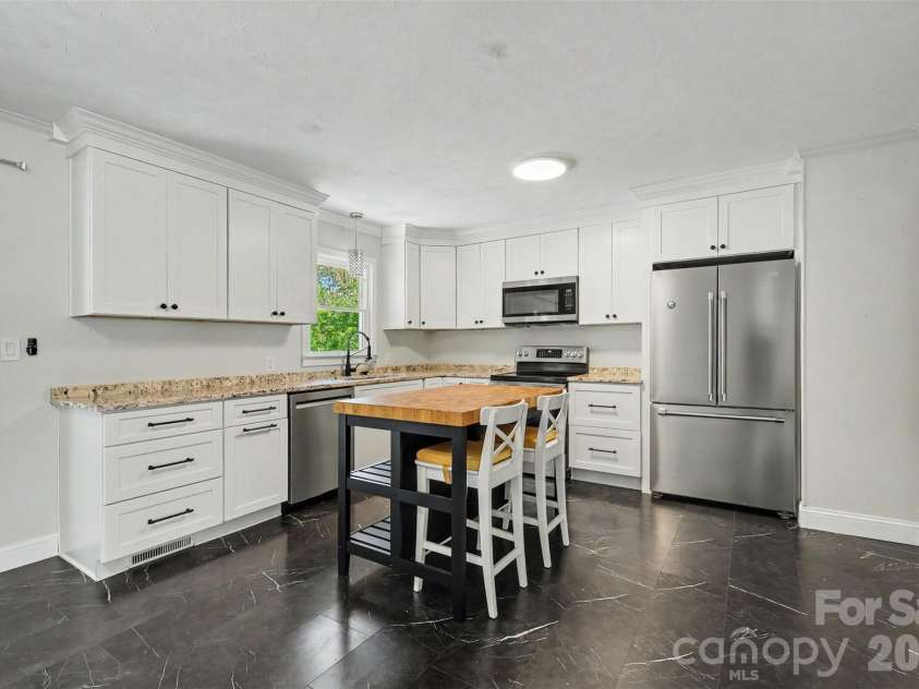 79 Walnut Street, Badin, NC 28009.  MLS# CAR4377814, YatesRealty ID 24187. 