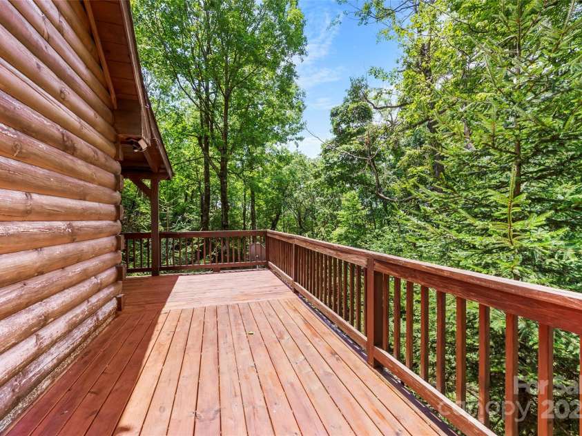 70 Wetherbee Lane, Rosman, NC 28772.  MLS# CAR4277160, YatesRealty ID 24192. Side Deck