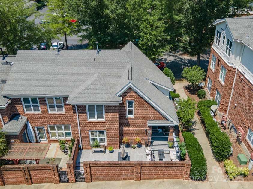 819 Northeast Drive, Davidson, NC 28036.  MLS# CAR4276218, YatesRealty ID 24193. Aerial view of this end unit.
