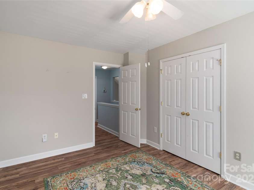 819 Northeast Drive, Davidson, NC 28036.  MLS# CAR4276218, YatesRealty ID 24193. Bedroom 3 has double closet.