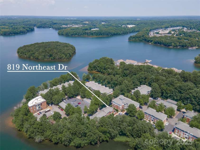 819 Northeast Drive, Davidson, NC 28036.  MLS# CAR4276218, YatesRealty ID 24193. Enjoy the 200 acre lake on you paddle board or kayak. Peace and quiet.