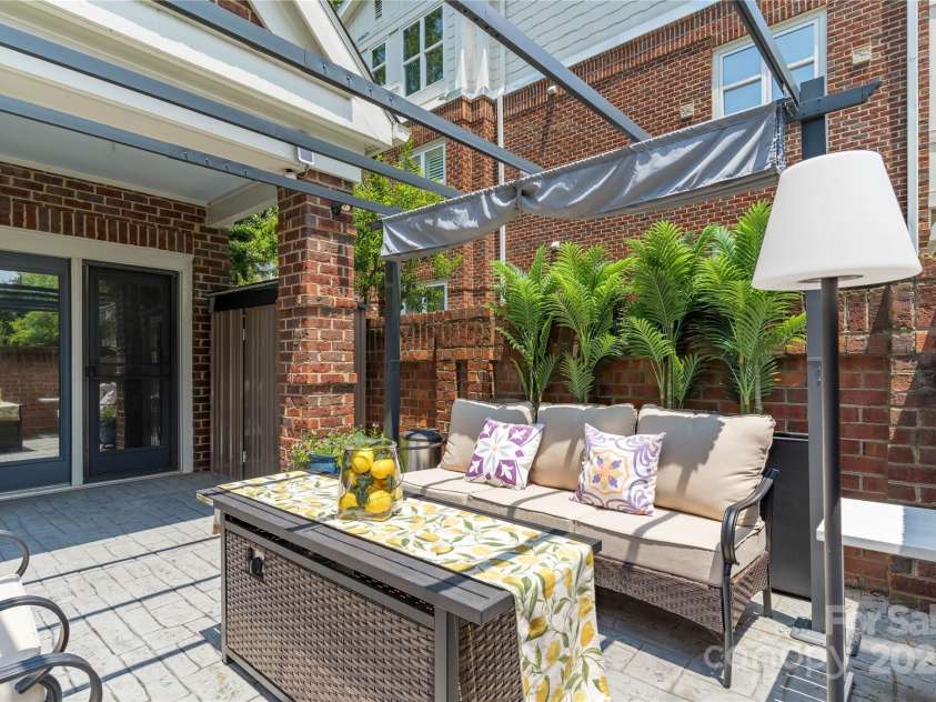 819 Northeast Drive, Davidson, NC 28036.  MLS# CAR4276218, YatesRealty ID 24193. Enjoy your private patio, while entertaining.