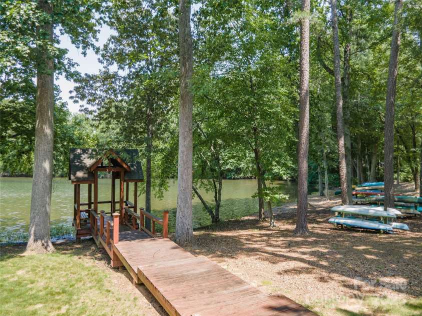 819 Northeast Drive, Davidson, NC 28036.  MLS# CAR4276218, YatesRealty ID 24193. Rent a space on the kayak/paddle board rack to access the lake.