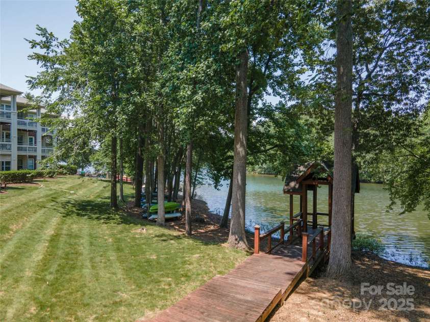 819 Northeast Drive, Davidson, NC 28036.  MLS# CAR4276218, YatesRealty ID 24193. Stroll around the edges of Lake Davidson and feel the breezes.