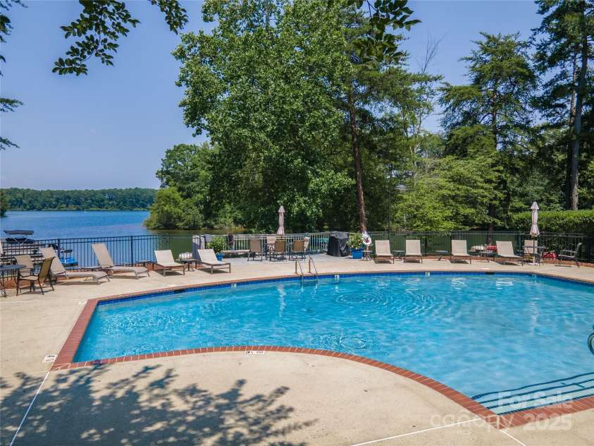 819 Northeast Drive, Davidson, NC 28036.  MLS# CAR4276218, YatesRealty ID 24193. Wonderful swimming pool over looking Lake Davidson.