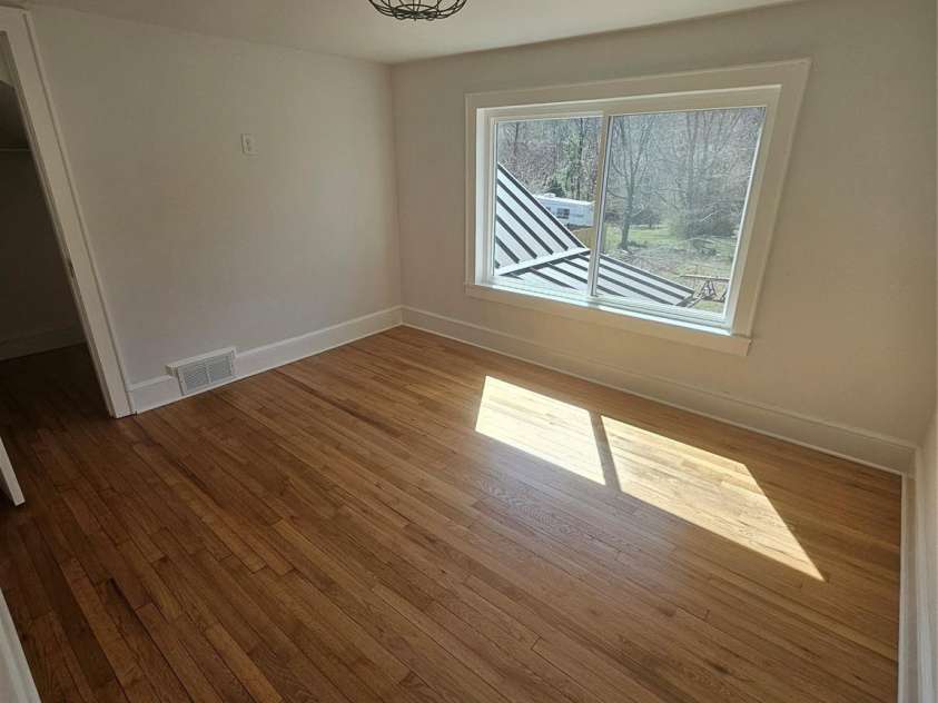 634 Rutherford Road, Marion, NC 28752.  MLS# CAR4240632, YatesRealty ID 242. Upstairs Middle BR