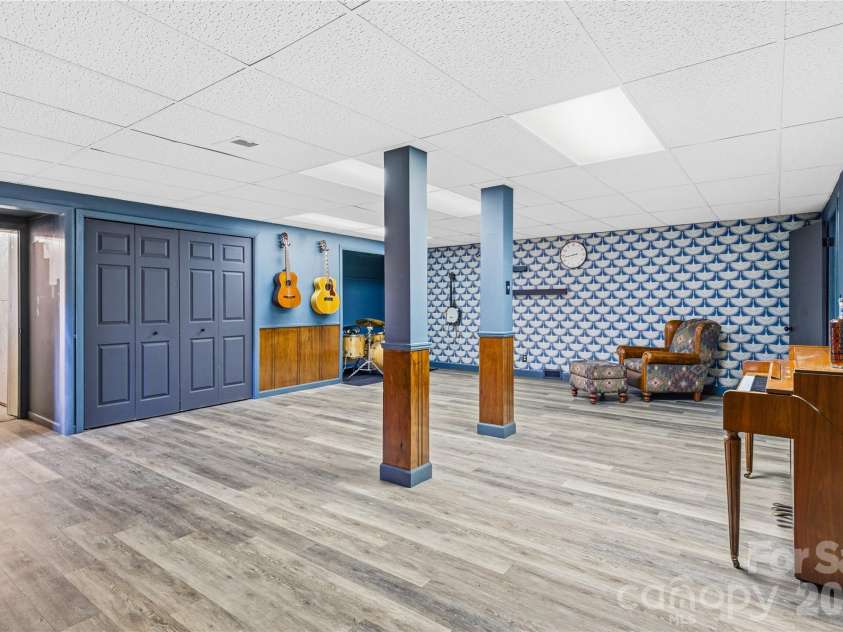 1373 Dogwood Drive, Maggie Valley, NC 28751.  MLS# CAR4320241, YatesRealty ID 2420. Entrance to 25' x 13' workshop with 2nd refrigerator