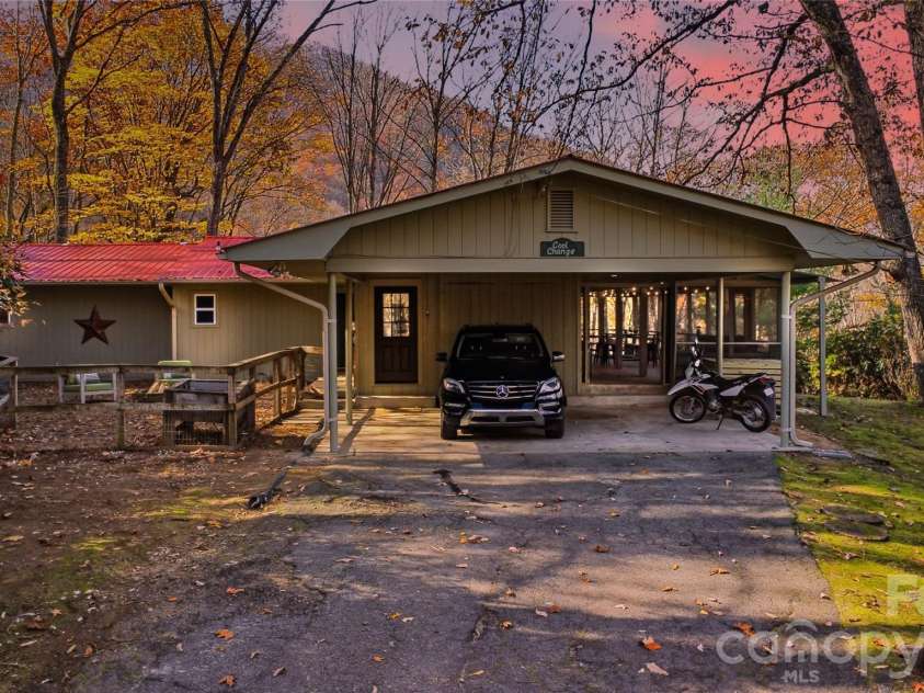 1373 Dogwood Drive, Maggie Valley, NC 28751.  MLS# CAR4320241, YatesRealty ID 2420. Oversized carport with storage and easy to enclose