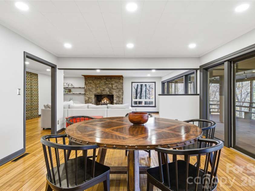 1373 Dogwood Drive, Maggie Valley, NC 28751.  MLS# CAR4320241, YatesRealty ID 2420. Spacious, elegant dining that extends outdoors