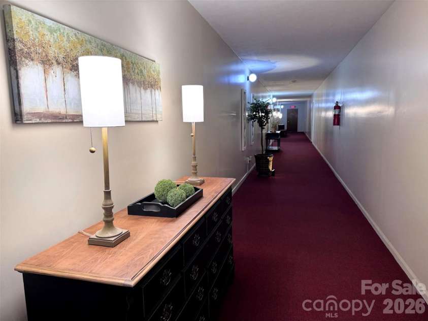 427 6th Avenue, Hendersonville, NC 28739.  MLS# CAR4379702, YatesRealty ID 2420. Building interior hallway