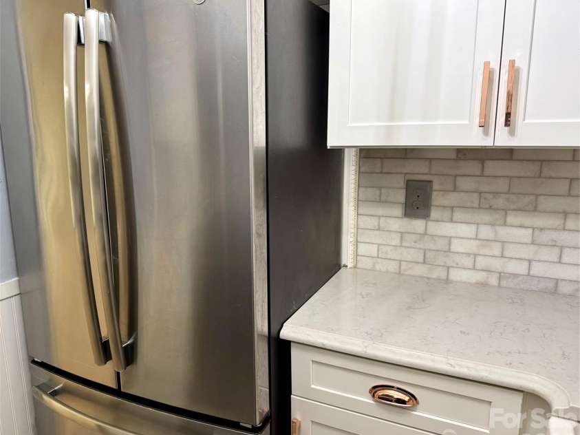 427 6th Avenue, Hendersonville, NC 28739.  MLS# CAR4379702, YatesRealty ID 2420. Full-size refrigerator with ice maker.