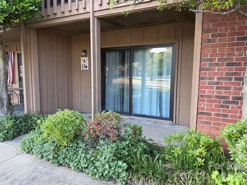 427 6th Avenue, Hendersonville, NC 28739.  MLS# CAR4379702, YatesRealty ID 2420. Newer sliding door provides extra soundproofing and insulation.