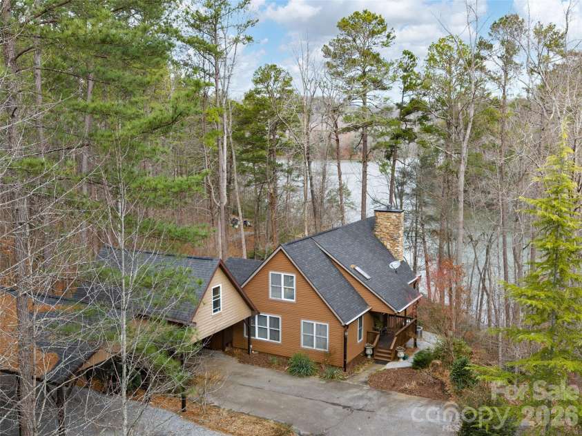 201 Hawk Ridge Drive, Mill Spring, NC 28756.  MLS# CAR4349061, YatesRealty ID 24206. Perched above the lake