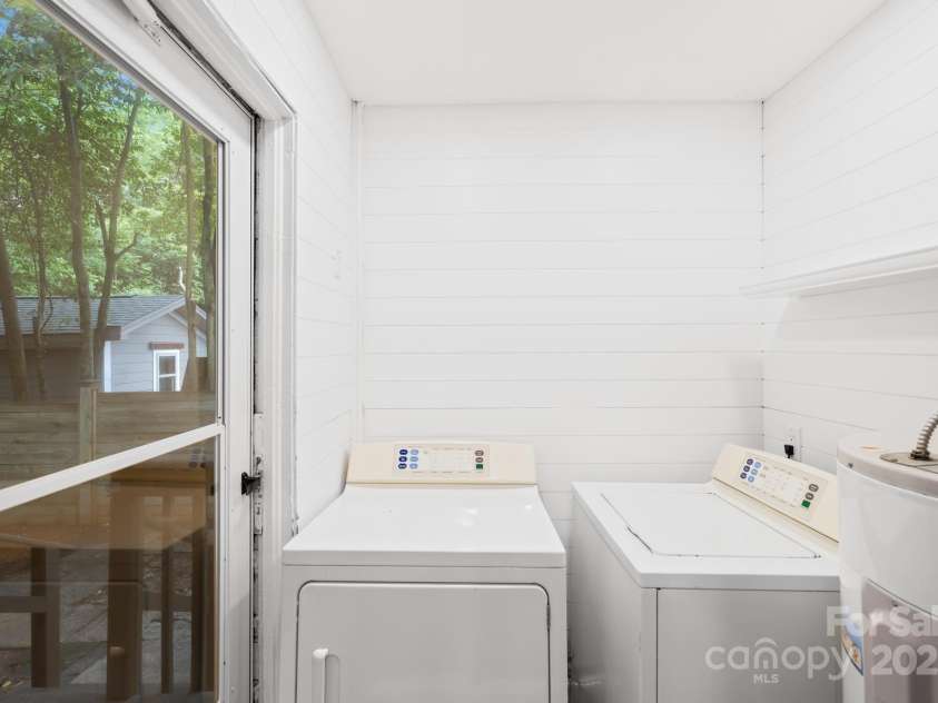 4114 Stacy Boulevard, Charlotte, NC 28209.  MLS# CAR4258425, YatesRealty ID 24208. Laundry room is located off of the kitchen.