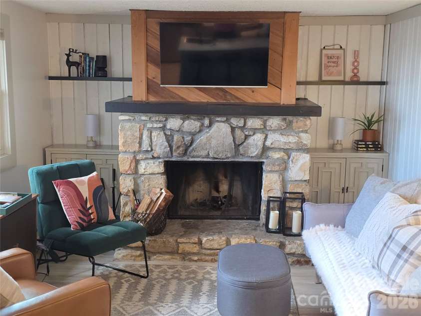 108 Northridge Road, Banner Elk, NC 28604.  MLS# CAR4351937, YatesRealty ID 2421. Very warming fireplace
