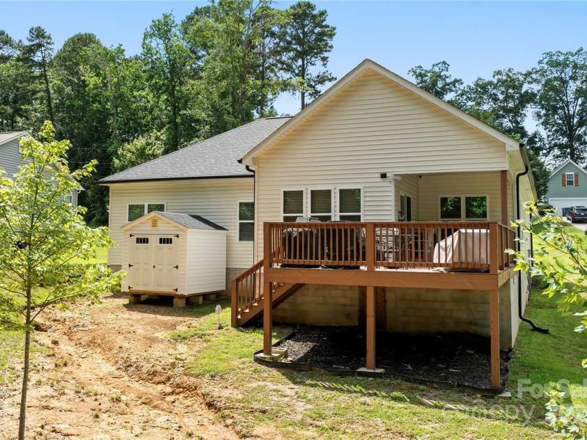 7516 O'Hara Street, Huntersville, NC 28078.  MLS# CAR4273660, YatesRealty ID 24215. Back view, storage shed, walk in crawl space with plenty of storage