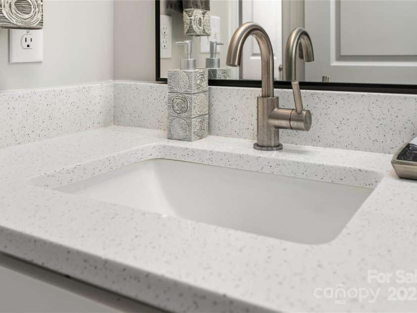 7516 O'Hara Street, Huntersville, NC 28078.  MLS# CAR4273660, YatesRealty ID 24215. Beautiful white countertops with silver flecks throughout