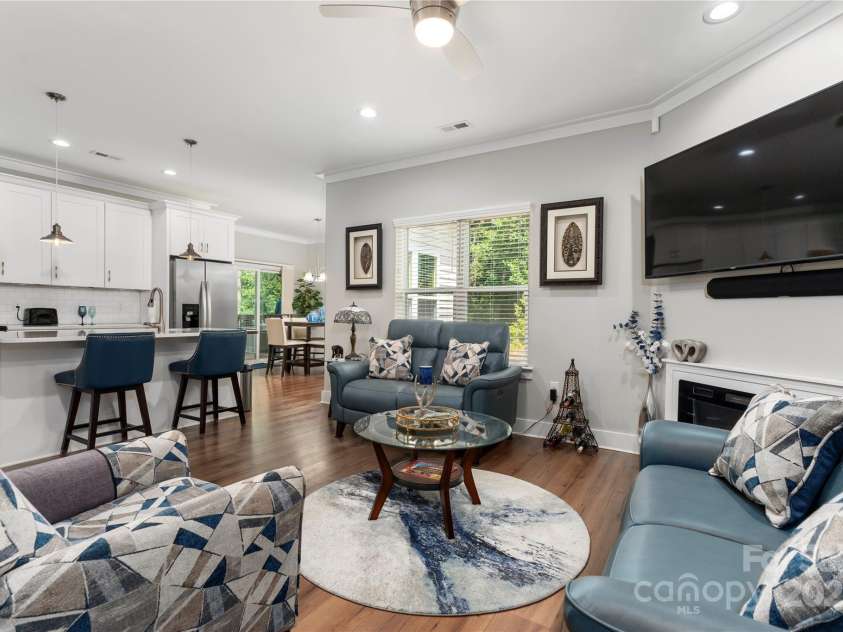 7516 O'Hara Street, Huntersville, NC 28078.  MLS# CAR4273660, YatesRealty ID 24215. Living room open to kitchen