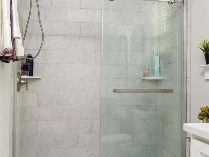 7516 O'Hara Street, Huntersville, NC 28078.  MLS# CAR4273660, YatesRealty ID 24215. Primary tiled shower