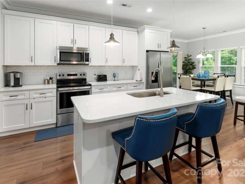 7516 O'Hara Street, Huntersville, NC 28078.  MLS# CAR4273660, YatesRealty ID 24215. View to kitchen and DR