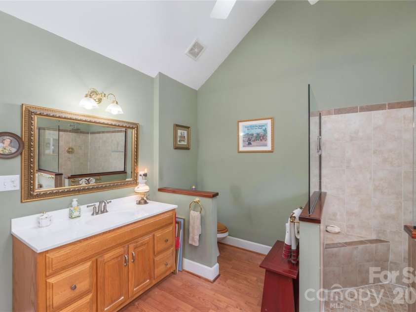 209 Browning Road, Waynesville, NC 28786.  MLS# CAR4360694, YatesRealty ID 24216. Primary bathroom with walk-in shower.