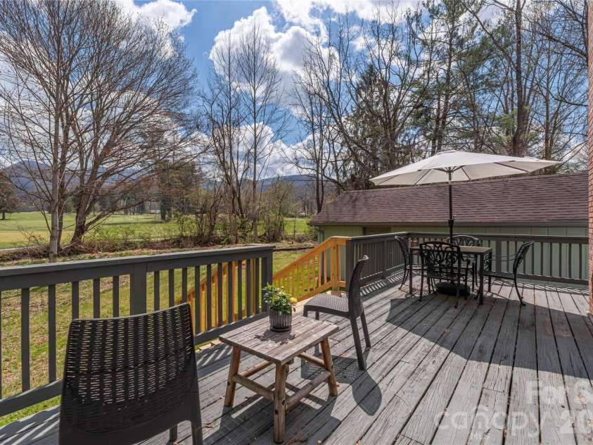 209 Browning Road, Waynesville, NC 28786.  MLS# CAR4360694, YatesRealty ID 24216. Relax on the deck.