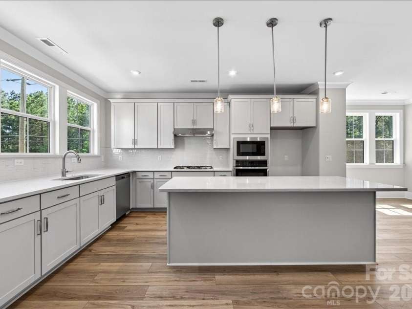 12023 Elsa Lane, Charlotte, NC 28277.  MLS# CAR4330507, YatesRealty ID 24220. Ample natural light in the gourmet kitchen