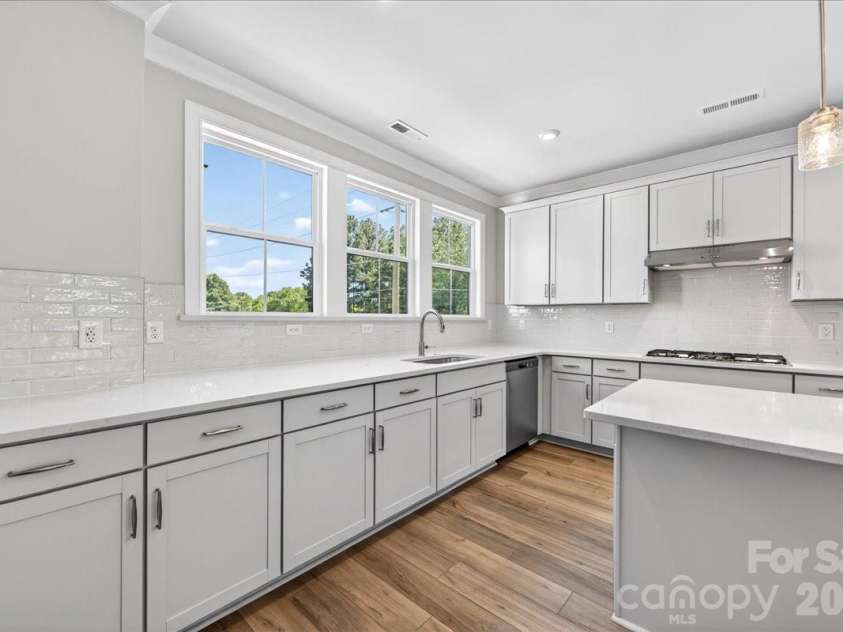 12023 Elsa Lane, Charlotte, NC 28277.  MLS# CAR4330507, YatesRealty ID 24220. Ample storage in the gourmet kitchen