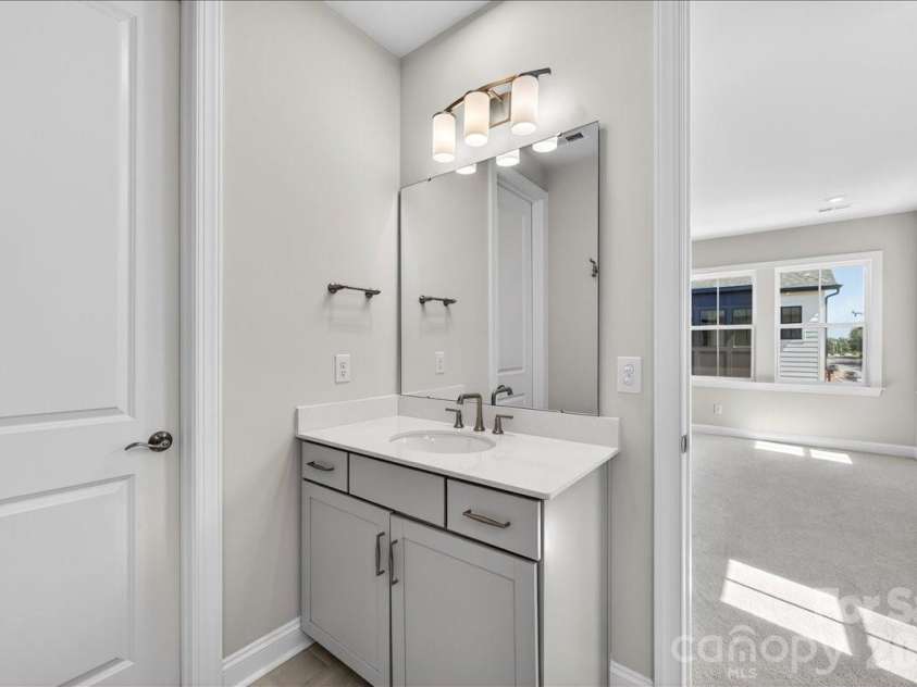 12023 Elsa Lane, Charlotte, NC 28277.  MLS# CAR4330507, YatesRealty ID 24220. Dual Vanity primary bathroom