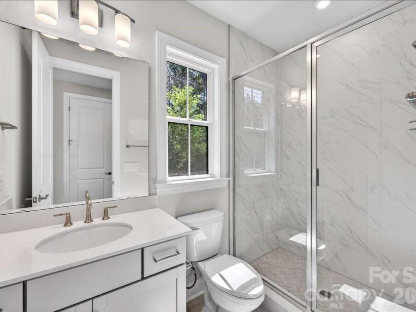 12023 Elsa Lane, Charlotte, NC 28277.  MLS# CAR4330507, YatesRealty ID 24220. GenSmart first floor full bathroom