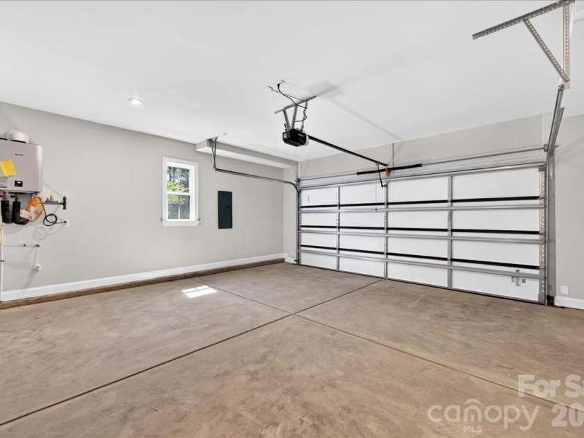 12023 Elsa Lane, Charlotte, NC 28277.  MLS# CAR4330507, YatesRealty ID 24220. Large 2 bay garage