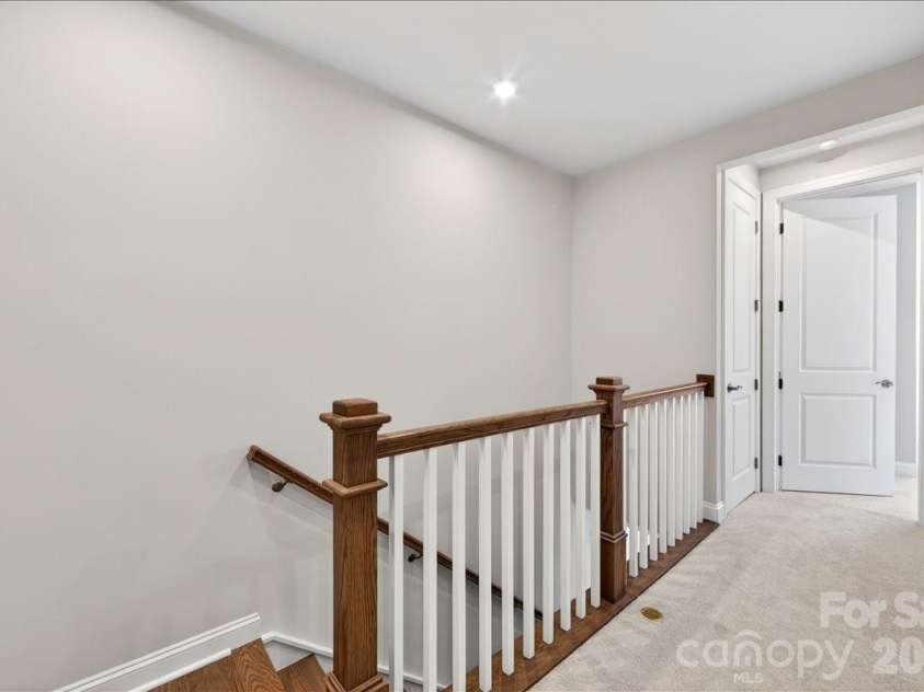 12023 Elsa Lane, Charlotte, NC 28277.  MLS# CAR4330507, YatesRealty ID 24220. Third floor landing
