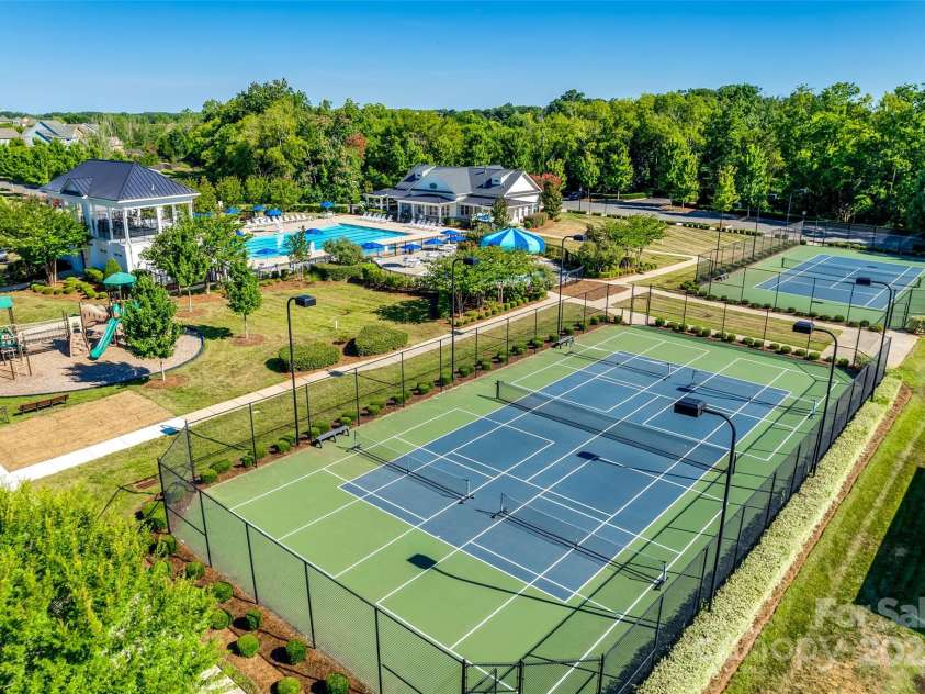 16008 Weeping Valley Drive, Fort Mill, SC 29715.  MLS# CAR4258885, YatesRealty ID 24223. McCullough community courts and playground