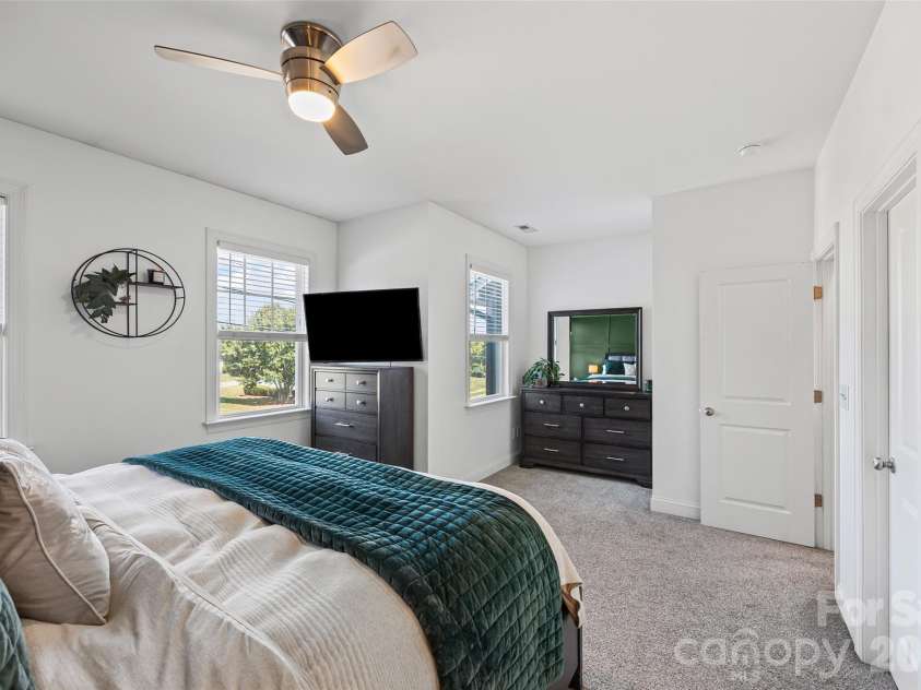 263 Keener Boulevard, Belmont, NC 28012.  MLS# CAR4341065, YatesRealty ID 24225. Spacious primary bedroom with walk-in closet