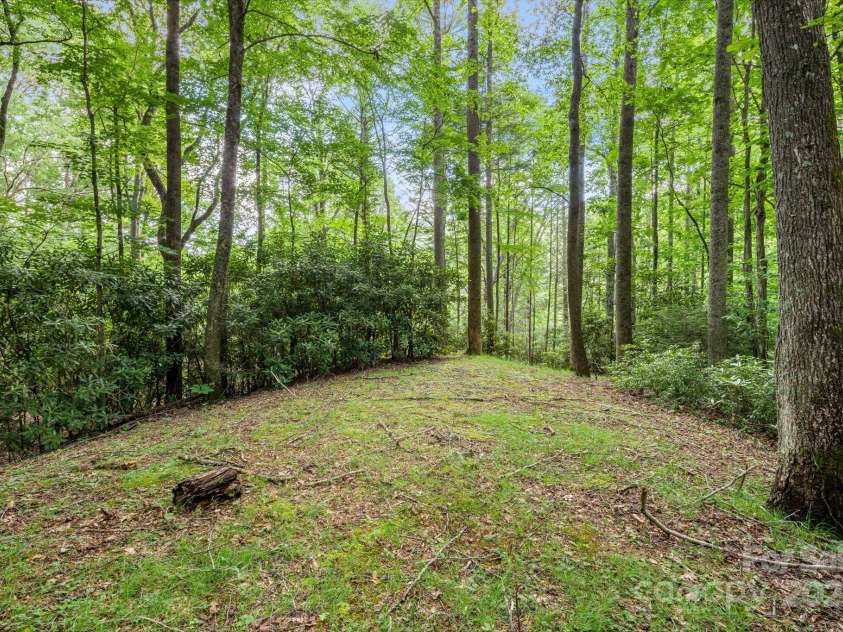 79 Creekside Lane, Spruce Pine, NC 28777.  MLS# CAR4272276, YatesRealty ID 24225. A private camping spot