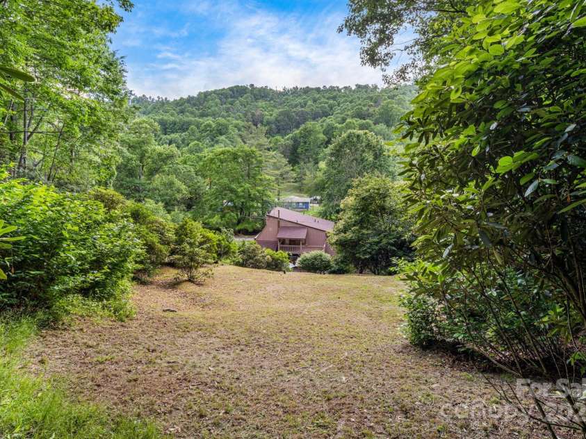 79 Creekside Lane, Spruce Pine, NC 28777.  MLS# CAR4272276, YatesRealty ID 24225. Peaceful, nature-connected