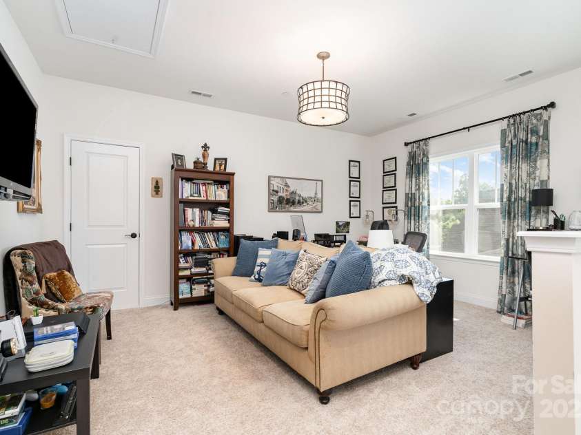 3899 Zemosa Lane, Concord, NC 28027.  MLS# CAR4275282, YatesRealty ID 24226. 2nd floor loft that leads to a large walk-in storage area.