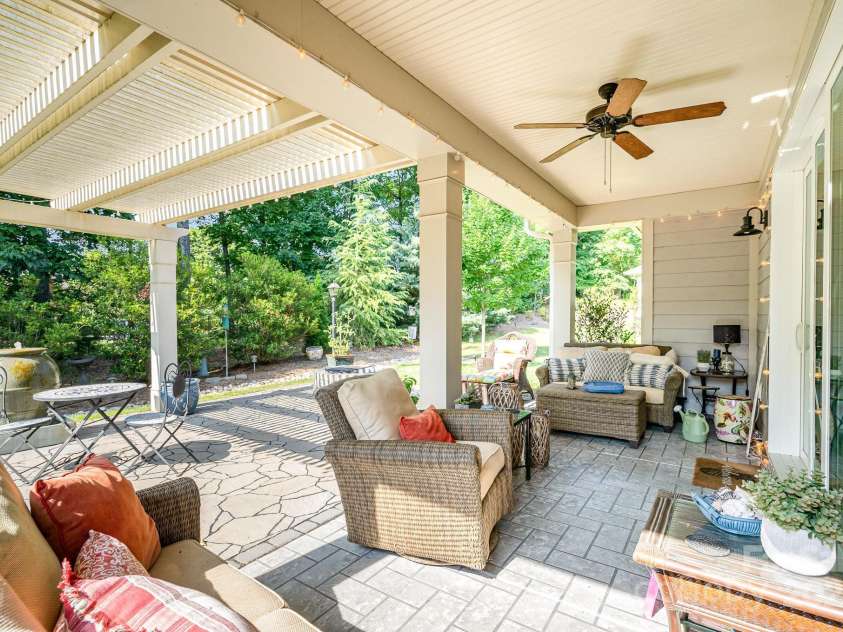 3899 Zemosa Lane, Concord, NC 28027.  MLS# CAR4275282, YatesRealty ID 24226. The covered rear porch area, fabulous for entertaining.