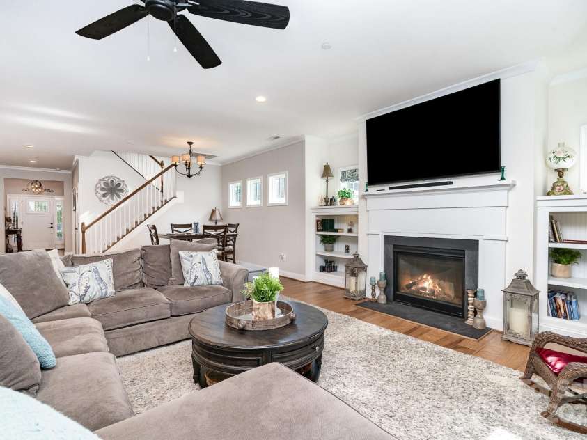 3899 Zemosa Lane, Concord, NC 28027.  MLS# CAR4275282, YatesRealty ID 24226. Wide open great room with a gas log fireplace.